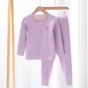 Conjunto de ropa interior térmica de seda de terciopelo para niños sin costuras otoño e invierno Pijama nuevo para bebé niños y niñas ropa de otoño pantalones de otoño