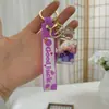 Llavero de Botella de Arena Líquida de Dibujos Animados, Pequeños Regalos para Puestos, Accesorios Acrílicos al por Mayor, Colgante Relleno de Aceite, Rasca Gatos Lindo de Regalo