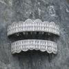 Europa y Estados Unidos hip-hop doble escalera cuadrado lleno de zirconias frenos hombres 8 dientes de oro flash grillz explosiones transfronterizas al por mayor