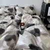 Conjunto de cama minimalista estilo Nantong de quatro peças, adequado para todas as estações, feito de algodão com estampa reativa