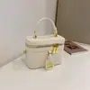 Bolso caja de color contrastante con textura de nicho, bolso de mano pequeño para mujer, nuevo bolso de moda 2026 versátil casual para hombro y cruzado
