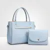 Set de bolsas de color sólido de lujo ligero para madre e hija, bolso de mano de gran capacidad para el día a día, bolso cruzado cuadrado pequeño simple y elegante versátil