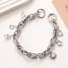 Nuevo Colgante de Estrella de Cinco Puntas Incrustado de Diamantes Ins Colgante para Bolso Cadena Metálica Colgante para Teléfono Móvil Cadena de Mano Versátil Personalizada