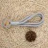 Directo de fábrica Amazon accesorios textiles para el hogar accesorios sección de corbatas de punto sección de hebilla magnética cuerda de corbata trenzada punto fuerte