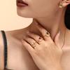 Anillo de lujo con líneas geométricas de estilo europeo y americano, apertura ajustable, acero de titanio, chapado en oro, con incrustaciones de circonio a mano.