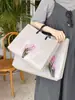 Tienda de Ropa Tulip Bolsas de Mano para Empaque de Ropa, Envoltura de Regalos, Bolsas de Compras Personalizadas No Tejidas