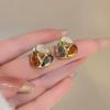 Pendientes coreanos de flores frescas y coloridas para mujer, modernos y ligeros, de lujo, con perlas de amor y un toque de estilo.