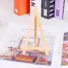 Venta directa Marco de fotos de madera maciza decorativo mini coreano Exhibidor de calendario de escritorio Estante de exhibición pequeño de madera para escritorio Caballete de madera triangular