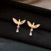 Pendientes de Lentejuelas Metálicas con Hojas Cruzadas Europeos y Americanos Diseño Único de Nicho Pendientes de Lujo Accesible Pendientes de Gama Alta para Mujeres
