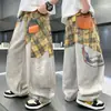 Ropa infantil jeans para niños 2026 nuevo estilo coreano dibujos animados pantalones largos para niños mayores, elegantes pantalones de primavera y otoño para niños