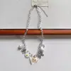 Collar de corazón de amor margarita lazo borla estilo Ins coreano sentido de diseño versátil exquisito collar de cuentas