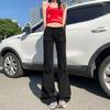 Novedad primavera y verano 2025 pantalones de mezclilla de color tannin micro-rugosos sin decoloración moda retro estilo americano mujer cintura baja micro-holgados jeans