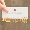 Set de pendientes de perla retorcida dorada estilo europeo y americano, pendientes metálicos geométricos en forma de C, pendientes para mujer de alta gama y únicos