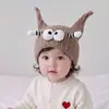 Bonitos y originales sombreros de estilo coreano para niños, cálidos gorros de punto para otoño e invierno, gorros de lana a prueba de viento y protectores de orejas para niños y niñas.