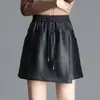 Falda-pantalón de pierna ancha, línea A, casual, versátil, con cintura elástica, de cuero PU, adelgazante, Negro, Novedad Otoño/Invierno 2026 para Mujer