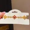 Pulsera de Lujo Ligero con Zirconia Calada Flor de Nácar de la Suerte Deslizante Joyería de Mano Francesa Exquisita de Gama Alta Nicho Personalizada