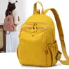 Mochila de tela de nailon impermeable 2026 para mujer, ligera, con múltiples compartimentos, elegante y versátil para viajes, comercio exterior transfronterizo