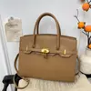 Bolso de Mano Versátil de Moda para Mujer 2026 Nuevo Modelo Bolso Platino de Gama Alta de Nicho Bolso Popular de Lujo para el Trabajo Hombro Cruzado