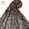 Tela bordada con lentejuelas primavera y verano nuevo red elástica bordado plano ropa de escenario moda para mujer vestido en stock suministro