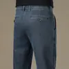 Elásticos, cálidos, suaves y amigables con la piel, confección 3D de proteína de lana, jeans casuales rectos holgados de talle alto para hombre