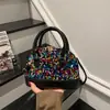 Design de lantejoulas estilo coreano transfronteiriço, moda doce e cool, nova bolsa de ombro casual de grande capacidade 2026