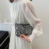Bolso de alta gama de primavera 2024, nuevo bolso de moda para mujer, bolso cruzado con lentejuelas de nicho, bolso de hombro para mujer con todo incluido.