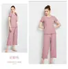 Venta al por mayor del fabricante Ciudad de Zhuming Estilo Primavera y Verano Nuevo Top de Manga Corta para Mujer con Encaje Fruncido, Ropa de Dormir Ligera y Transpirable