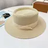 Sombrero de paja de ala ancha estilo francés para mujer, nuevo modelo de verano 2026, sombrero de playa transpirable con encaje calado para protección solar en la costa