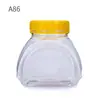 Frasco sellado de plástico PET de fábrica, plástico personalizado, fruta seca, tapa portátil, logotipo impreso, botella de miel, botella de boca ancha