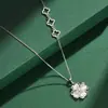Collar de Plata 999 Pura con Piedra Ojo de Gato y Trébol de Cuatro Hojas para Mujer, Cadena Clavicular de Lujo Ligero de Nicho Colgante, Joyería de Plata de Alta Gama