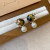 Pendientes de borla con carcasa de madera marrón transfronterizos europeos y americanos, pendientes de estilo vintage Maillard, pendientes de mujer de lujo ligero de alta gama