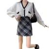 Falda de lana a cuadros para mujer, nuevo estilo otoño e invierno 2026, minifalda de línea A de cintura alta que estiliza para figuras menudas