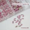 Diamante de Circonia Rosa con Base Plana para Arte de Uñas Modelo Transfronterizo de Cruz Caja de 12 Compartimentos Joyería Brillante de Circonia Rosa Claro de Tamaño Mediano para Uñas