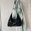 Textura retro gran capacidad 2026 color sólido temperamento invierno nuevo elegante casual bolso de mano bandolera mujer