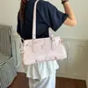 Bolsa de Cor Sólida com Bolinhas Feminina Nova Primavera 2026 Estilo Francês de Alto Valor para o Dia a Dia Bolsa de Ombro Tendência