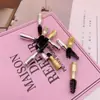Explosiones directas de fábrica brocha de maquillaje lápiz de cejas rizador de pestañas lápiz de cejas maquillaje sin accesorios cepillo para pestañas