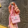 Llavero Colgante para Bolso Cadena para Teléfono Móvil Cachorro de Cabeza Chueca de Cuero PU Personalizado de Nicho Adornos de Alta Gama para Mujer