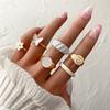 Amor transfronterizo diseño de anillo de 5/6 piezas anillo de corazón de durazno anillo de flor de mariposa con gota de aceite combinación de traje de anillo de perlas