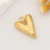 Accesorios de Acero Inoxidable Colgante de Corazón con Pluma de Venta Caliente Estilo Moda Acero de Titanio Colgante DIY Cruz Artículo de Venta Caliente Transfronterizo