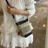 Bolso de Paja Tejida de Parche de Moda de Nicho para Mujer 2025 Nuevo Verano Bloqueo de Color Versátil Bolso Cruzado Tejido de Cubo