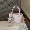 Bolsa de cesta feminina versátil estilo coreano, bolsa de mão estilo nicho, nova bolsa pequena 2026, bolsa balde da moda para mulheres