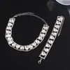 Conjunto de collar y pulsera de doble capa con forma de corazón incrustado de diamantes de estilo europeo y americano, sensación de lujo ligero y alta gama, cadena para la clavícula, accesorios de moda y versátiles al por mayor