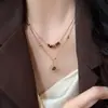 Collar con colgante de cadena de circonita iridiscente, cadena para suéter de lujo ligero de alta gama, cadena retro de nicho, joyería versátil al por mayor para mujer