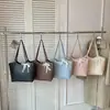 Bolsas de Mujer Transfronterizas, Bolsos de Alta Gama Súper Populares, Nuevo Bolso Tote de Hombro y Axila de Moda Exquisita de Primavera y Verano 2026