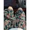 Comercio Exterior Verano Delgados Diseño Personalizado Sentido del Diseño Graffiti Juvenil Hombres Holgados Casual Pantalones de Playa Hipster Frescos Shorts de Cinco Puntos Hombres