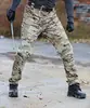 Calças táticas para homens, calças camufladas de primavera e outono, calças de trabalho, calças compridas multi-bolsos para atividades ao ar livre, calças compridas duráveis estilo militar IX7