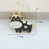 Fabricante de lindos accesorios de joyería, vaca de dibujos animados hechos a mano para joyería DIY al por mayor, accesorios de joyería DIY de aleación colorida