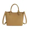 Bolso Pequeño Retro Estilo Occidental de Gama Alta para Mujer 2026 Nuevo Bolso de Hombro Cruzado de Moda Bolso Cubo de Mano