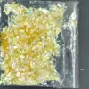 Venta al por mayor de fábrica fragmentos irregulares de mascotas color caramelo fragmentos de vidrio de color mágico papel de vidrio para uñas