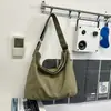 Bolso cruzado de lona de color liso simple Shuai Mi para mujer, bolso de gran capacidad para el trabajo, bolso de hombro casual para viajes, de nicho y ligero